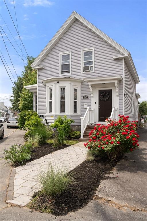 120 Fulton St, Lowell, MA 01850 - view of front of house with cooling unit