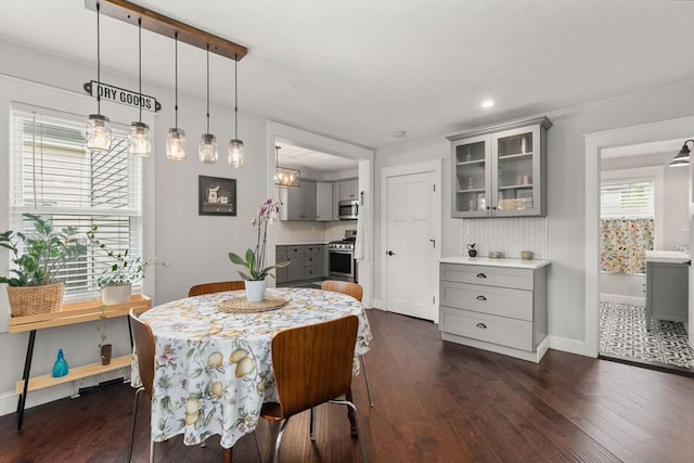 120 Fulton St, Lowell, MA 01850 - dining area with dark wood-style floors, baseboards, and recessed lighting