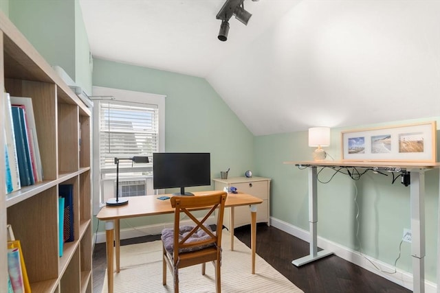 120 Fulton St, Lowell, MA 01850 - home office with lofted ceiling, wood finished floors, and baseboards