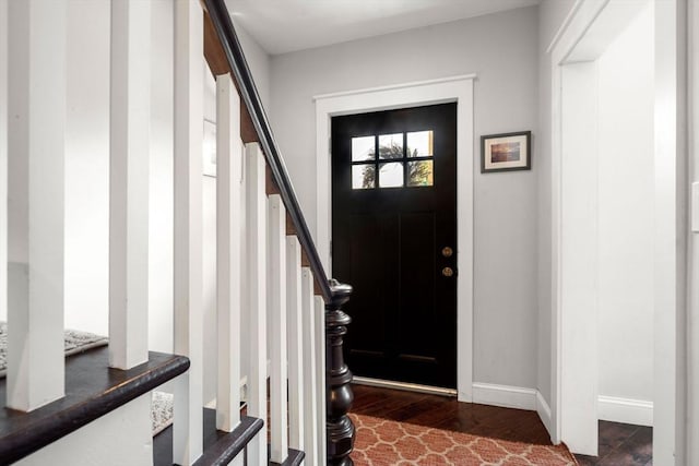 120 Fulton St, Lowell, MA 01850 - entryway featuring stairs, wood finished floors, and baseboards