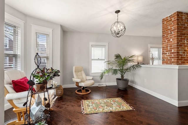 120 Fulton St, Lowell, MA 01850 - sitting room featuring healthy amount of natural light, wood-type flooring, and baseboards