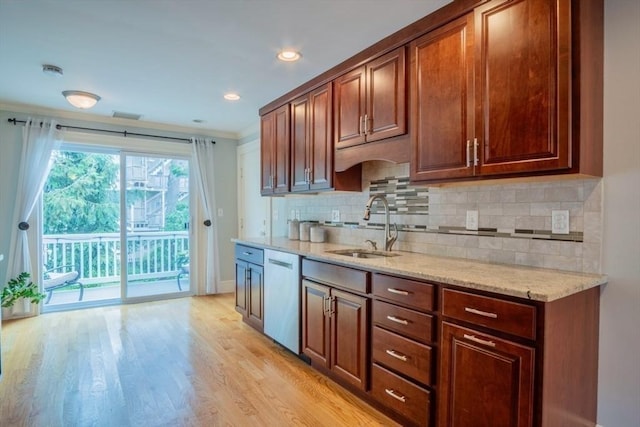29 Carlton St Unit 2, Salem, MA 01970 - kitchen featuring dishwashing machine, light wood-style flooring, backsplash, crown molding, and light stone countertops
