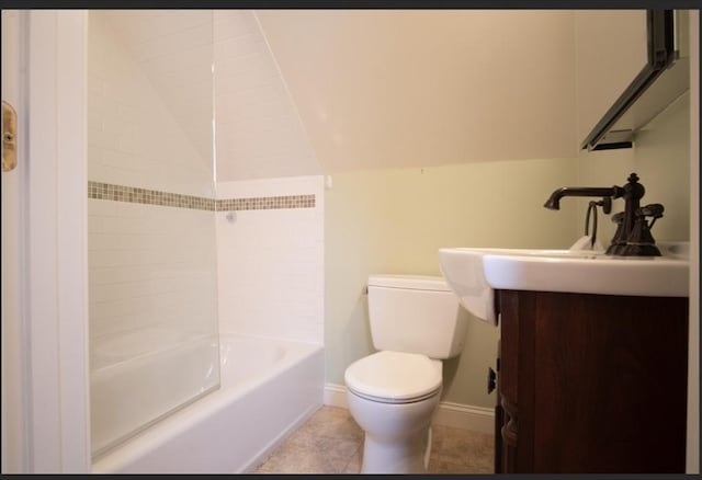 29 Carlton St Unit 2, Salem, MA 01970 - bathroom with lofted ceiling, vanity, bathtub / shower combination, and tile patterned flooring