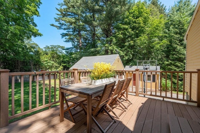 21 Studio Rd, Newton, MA 02466 - wooden deck with outdoor dining area and a yard