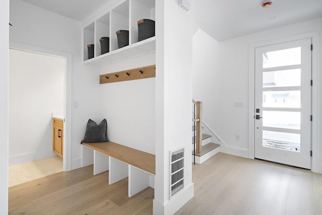 mudroom with light wood-style floors