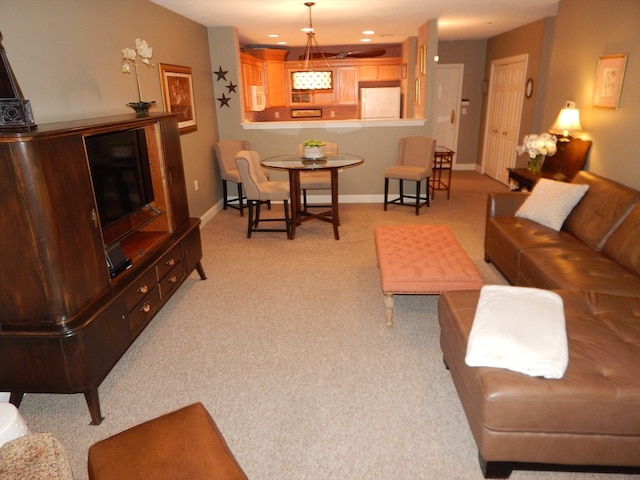 living room with light colored carpet