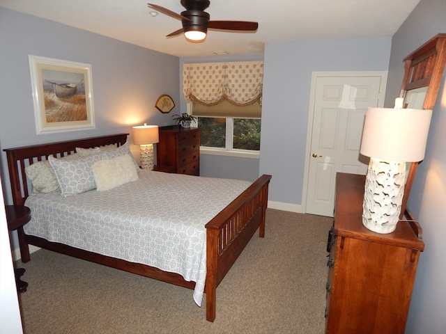 bedroom with light carpet and ceiling fan