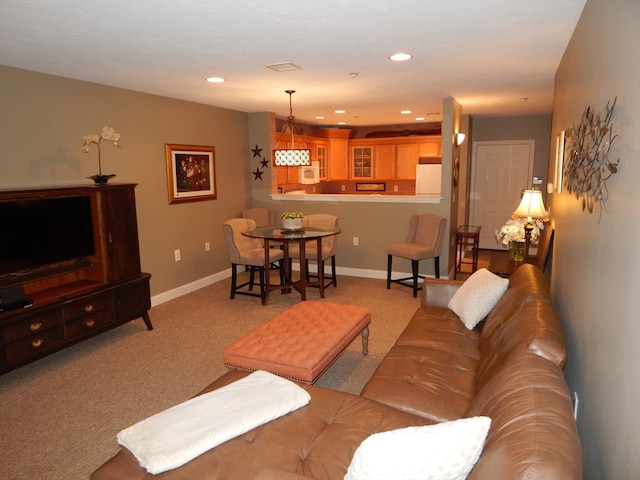 living room with light colored carpet