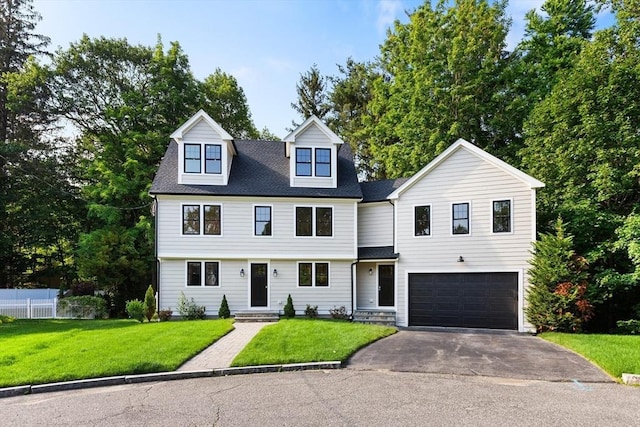 6 Ivy Cir, Winchester, MA 01890 - view of front of house featuring an attached garage, asphalt driveway, and entry steps
