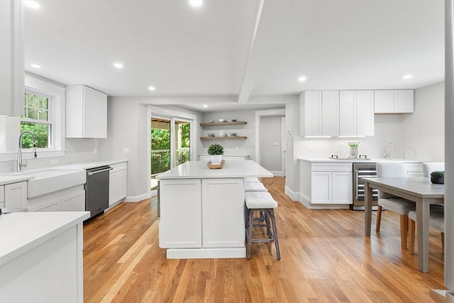 6 Ivy Cir, Winchester, MA 01890 - kitchen featuring wine cooler, dishwasher, recessed lighting, white cabinetry, and beam ceiling