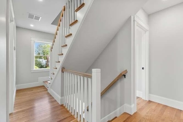 6 Ivy Cir, Winchester, MA 01890 - staircase featuring wood finished floors and recessed lighting