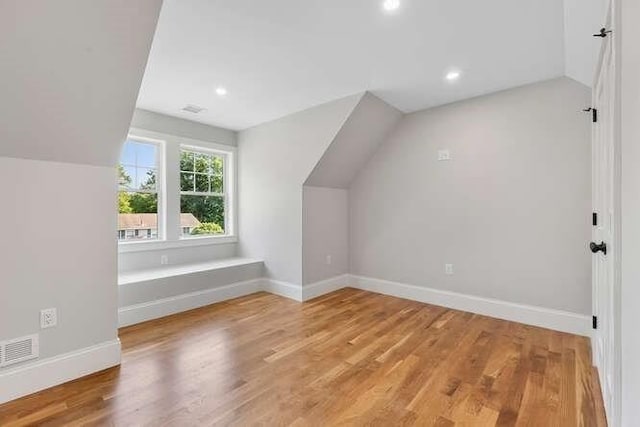 6 Ivy Cir, Winchester, MA 01890 - bonus room featuring vaulted ceiling, wood finished floors, and recessed lighting
