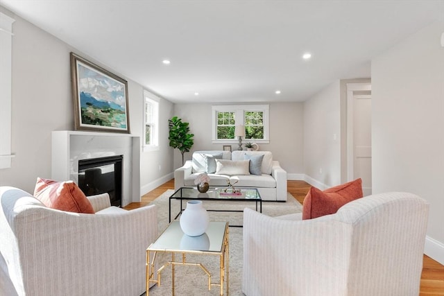 6 Ivy Cir, Winchester, MA 01890 - living area with a high end fireplace, light wood-type flooring, and recessed lighting