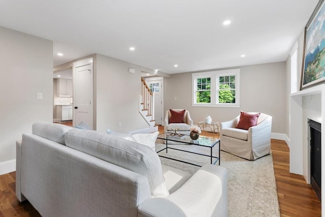 6 Ivy Cir, Winchester, MA 01890 - living area featuring stairs, wood finished floors, recessed lighting, and a fireplace