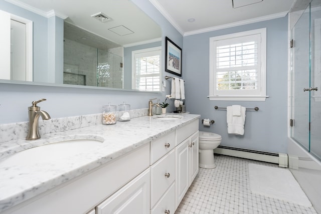 bathroom with vanity, toilet, ornamental molding, and a baseboard radiator