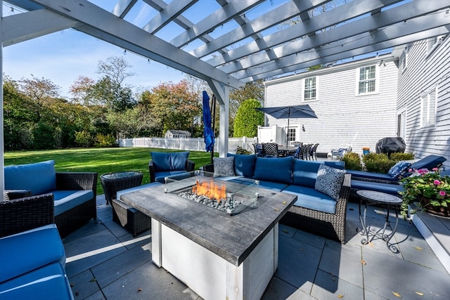 view of patio / terrace featuring a pergola and an outdoor living space with a fire pit