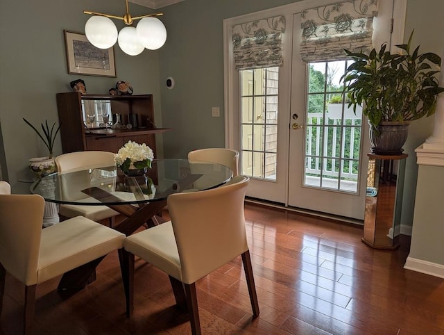 190 Chickering Rd Unit 313D, North Andover, MA 01845 - dining room with healthy amount of natural light, wood finished floors, and baseboards