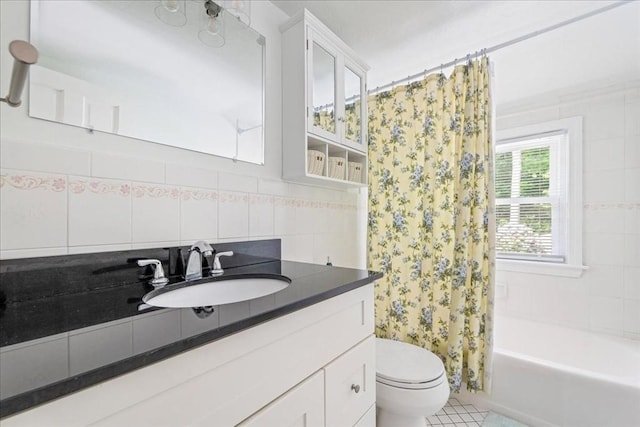 49 Karen Rd, Hanover, MA 02339 - full bathroom featuring vanity, toilet, shower / tub combo, and decorative backsplash