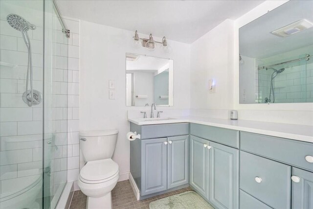 49 Karen Rd, Hanover, MA 02339 - full bathroom featuring toilet, a stall shower, vanity, and tile patterned floors