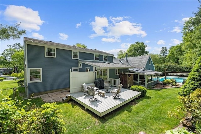 49 Karen Rd, Hanover, MA 02339 - rear view of property featuring a wooden deck and a sunroom
