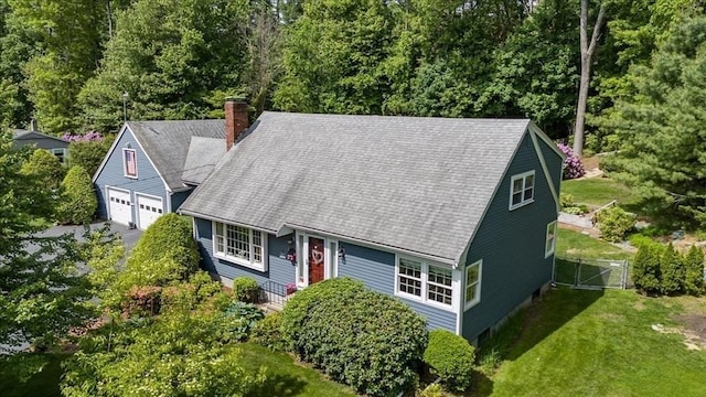 49 Karen Rd, Hanover, MA 02339 - view of front of home featuring a chimney, a gate, a front lawn, and roof with shingles