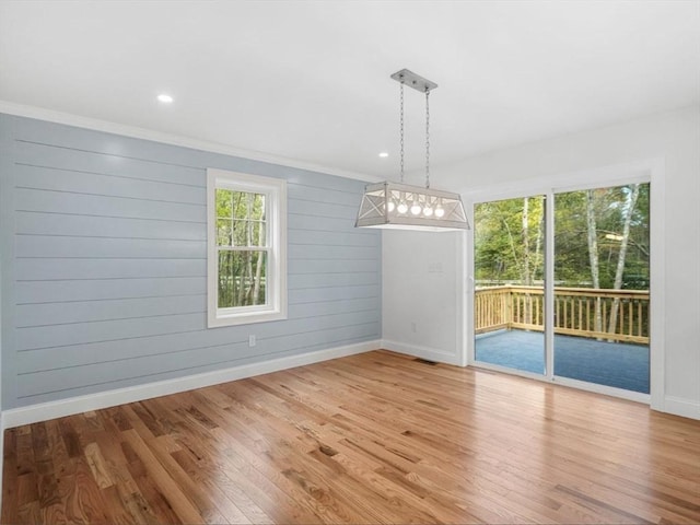 316 Old Westport Rd, Dartmouth, MA 02747 - unfurnished dining area featuring baseboards, wood finished floors, crown molding, and recessed lighting