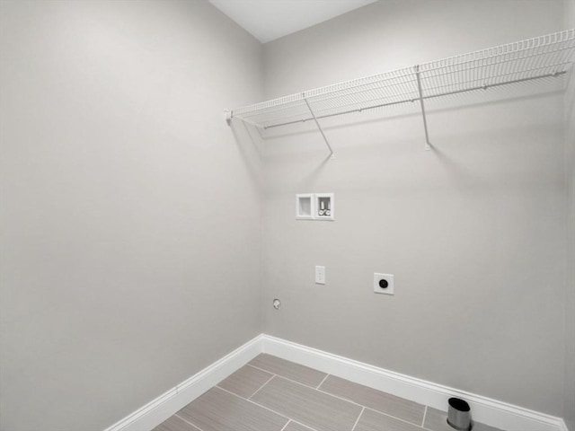 316 Old Westport Rd, Dartmouth, MA 02747 - laundry room with electric dryer hookup, washer hookup, baseboards, and hookup for a gas dryer