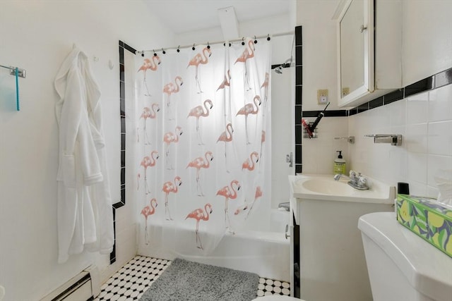 full bath featuring a baseboard radiator, tile walls, toilet, shower / tub combo, and vanity