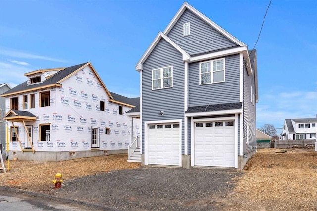 view of front of property with an attached garage and driveway