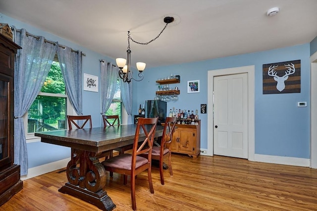 110 Middlefield Rd, Chester, MA 01011 - dining area with a chandelier and light wood-type flooring