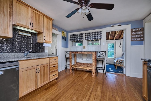 110 Middlefield Rd, Chester, MA 01011 - kitchen with stainless steel dishwasher, light brown cabinets, wainscoting, wood finished floors, and ceiling fan