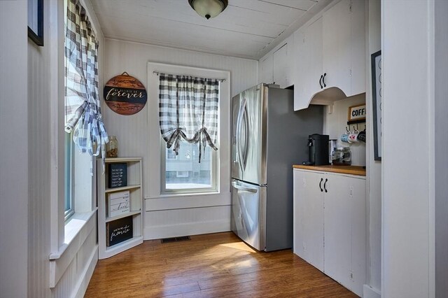 110 Middlefield Rd, Chester, MA 01011 - kitchen featuring healthy amount of natural light, freestanding refrigerator, dark wood finished floors, and white cabinetry