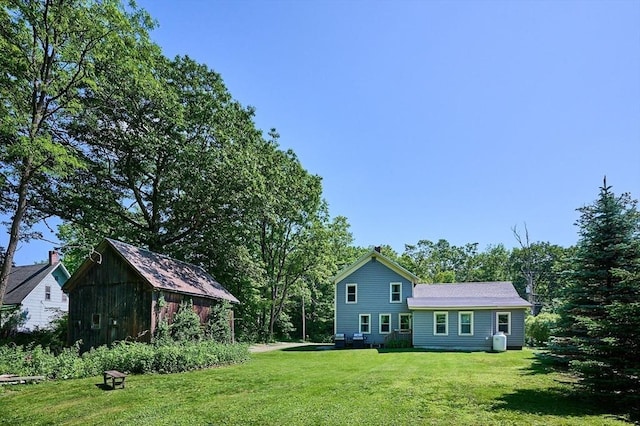 110 Middlefield Rd, Chester, MA 01011 - back of house with a yard and a shed