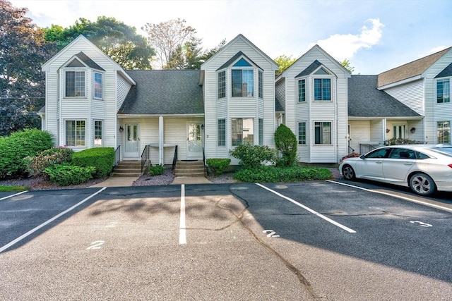25 Church St Unit 2, Weymouth, MA 02189 - view of front of home featuring uncovered parking and a shingled roof
