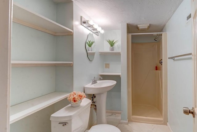 25 Church St Unit 2, Weymouth, MA 02189 - full bath with a stall shower, toilet, baseboards, marble look tile flooring, and a textured ceiling