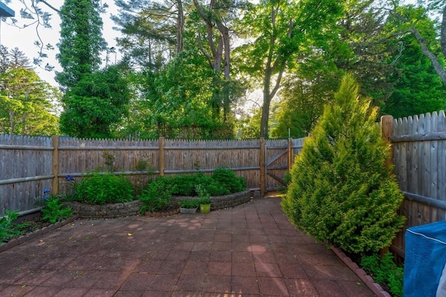 25 Church St Unit 2, Weymouth, MA 02189 - fenced backyard with a patio area