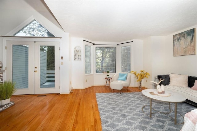 25 Church St Unit 2, Weymouth, MA 02189 - living room with wood finished floors and baseboards