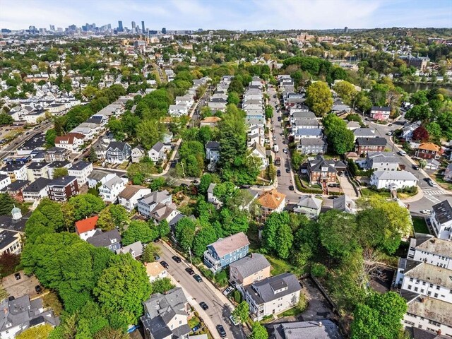 aerial overview of property's location with nearby suburban area