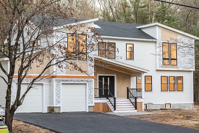 view of front of house with a garage