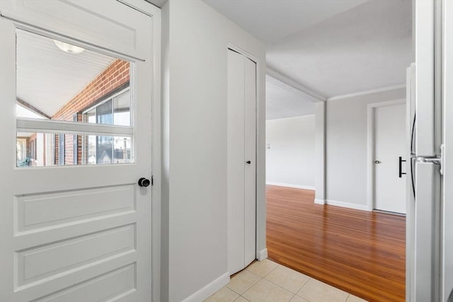 entryway featuring light tile patterned flooring