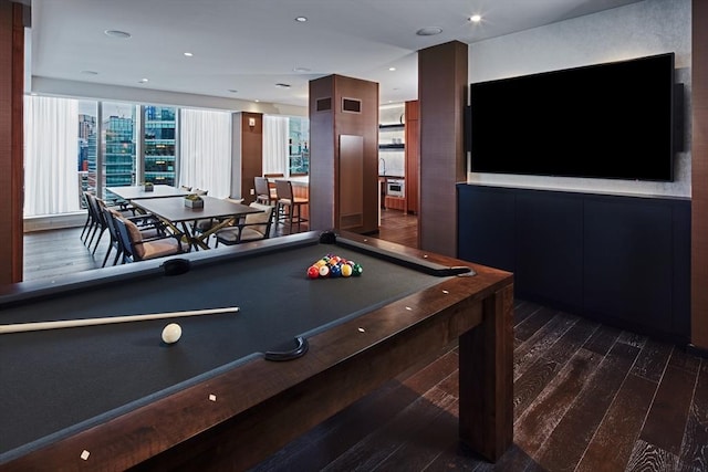 playroom featuring dark hardwood / wood-style flooring and pool table