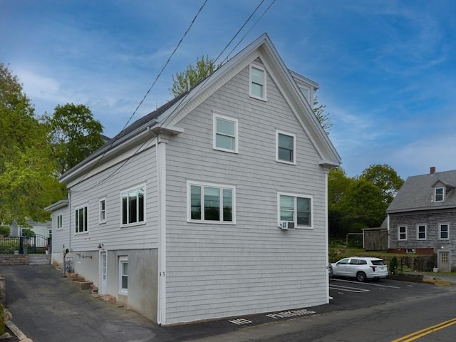 74 E Main St Unit 3, Gloucester, MA 01930 - view of home's exterior with uncovered parking