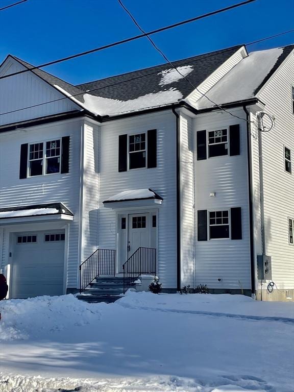 view of front of home with a garage