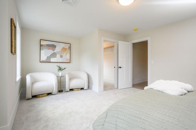 20 Howland Trl Unit 10, Hanson, MA 02341 - bedroom featuring light carpet and a walk in closet