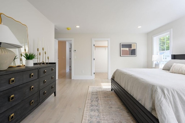 20 Howland Trl Unit 10, Hanson, MA 02341 - bedroom featuring light wood finished floors, recessed lighting, and a spacious closet