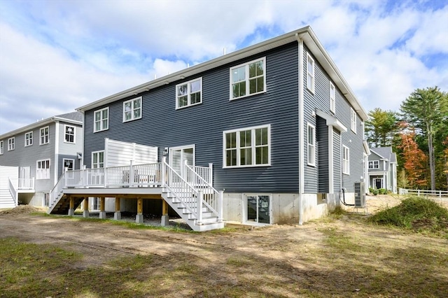 20 Howland Trl Unit 10, Hanson, MA 02341 - back of property featuring stairs and a deck
