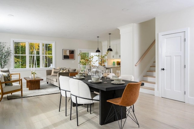 20 Howland Trl Unit 10, Hanson, MA 02341 - dining area featuring light wood-type flooring and stairs