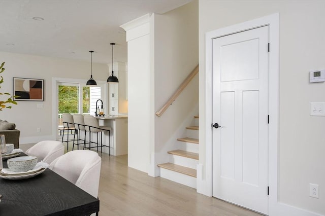 20 Howland Trl Unit 10, Hanson, MA 02341 - stairway featuring wood finished floors