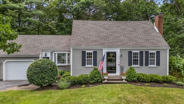 125 Grove St, Norwell, MA 02061 - cape cod house featuring a garage, a chimney, a front yard, and a shingled roof
