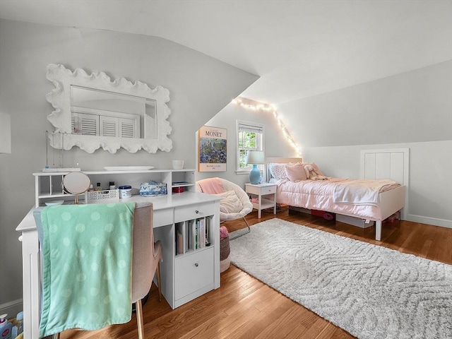125 Grove St, Norwell, MA 02061 - bedroom with lofted ceiling and wood finished floors